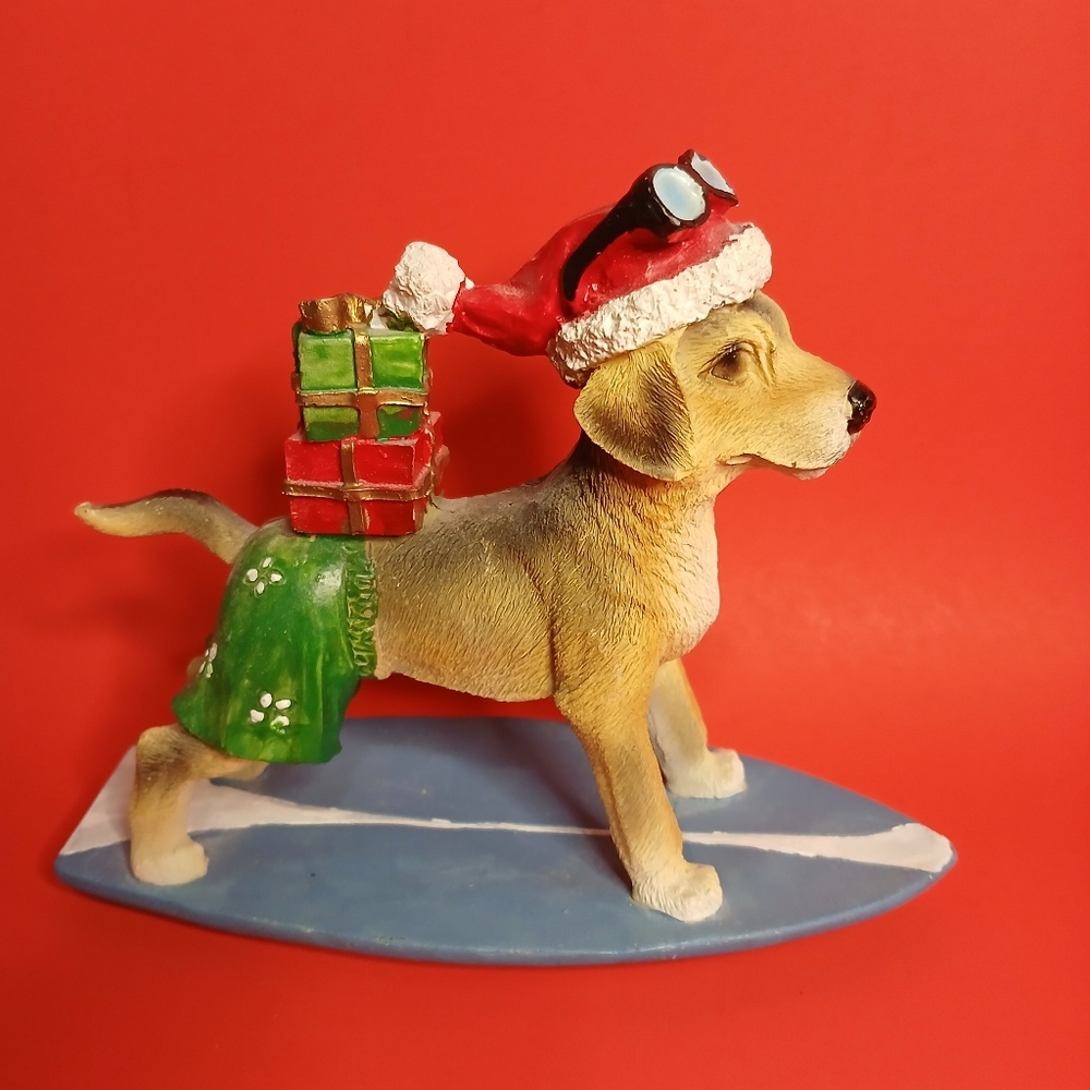 Old Time Pottery, Surfing golden  retriever dog figurine with Santa hat deliveri